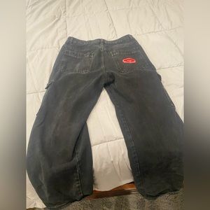 Black cargo jeans with a patch